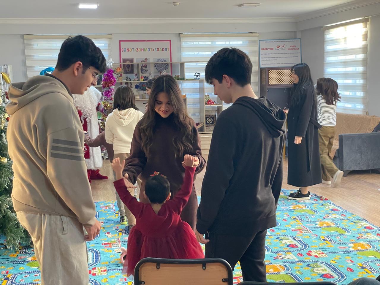 Volunteers playing with orphanage children