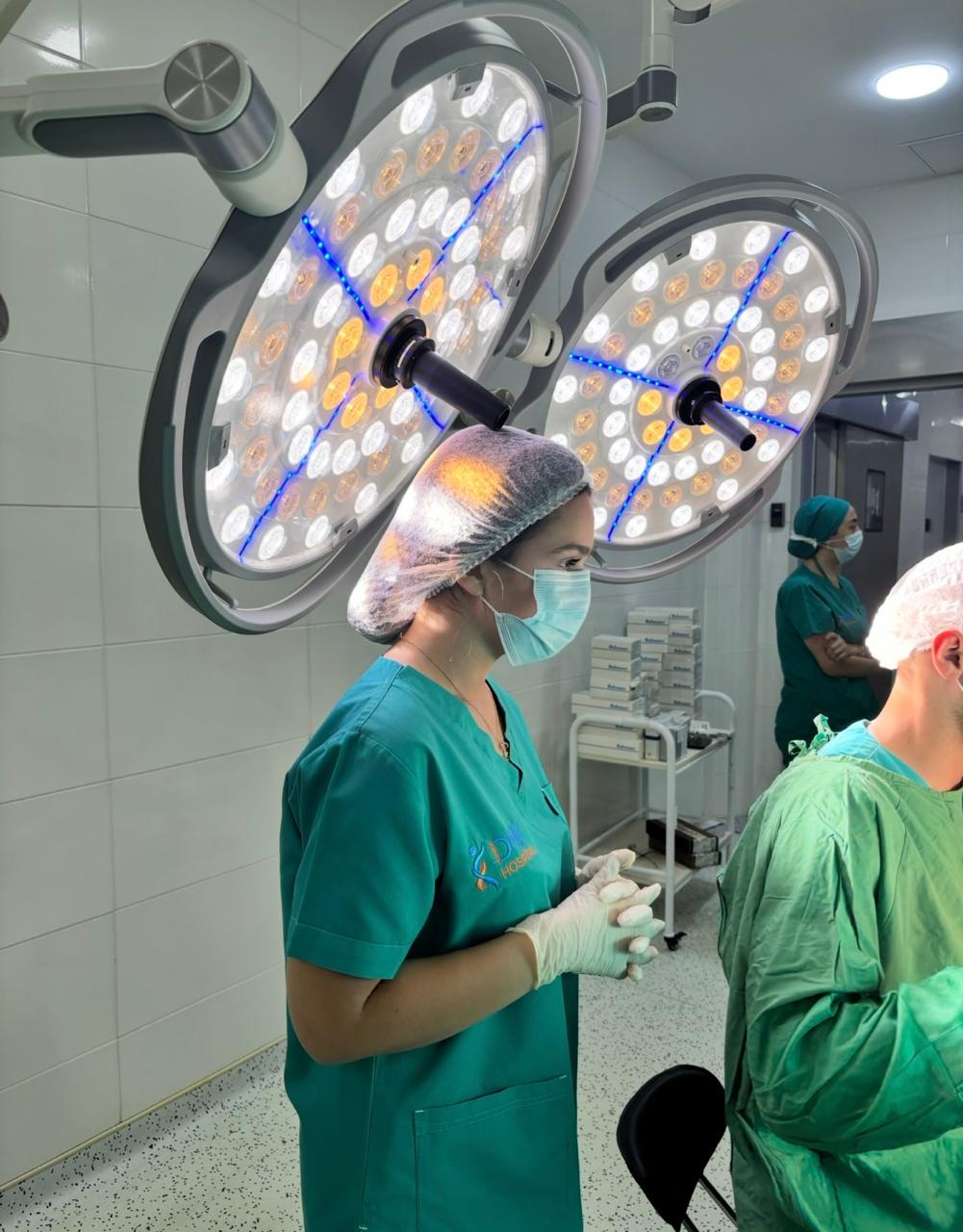Farah scrubbed in and present in the operating room during a procedure